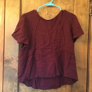 Maroon colored high low blouse